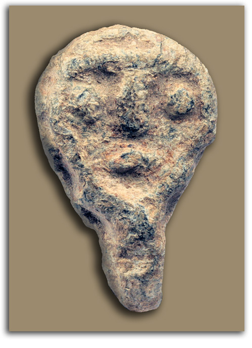 celtic-doubleface-1 Image of doubleface stone carving.