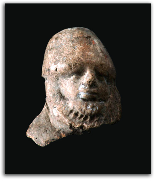 gv16-head Image of stone carved head.