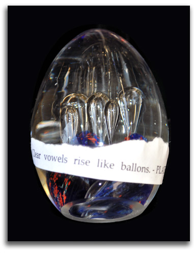 plath Image of transparent egg-shaped objet.